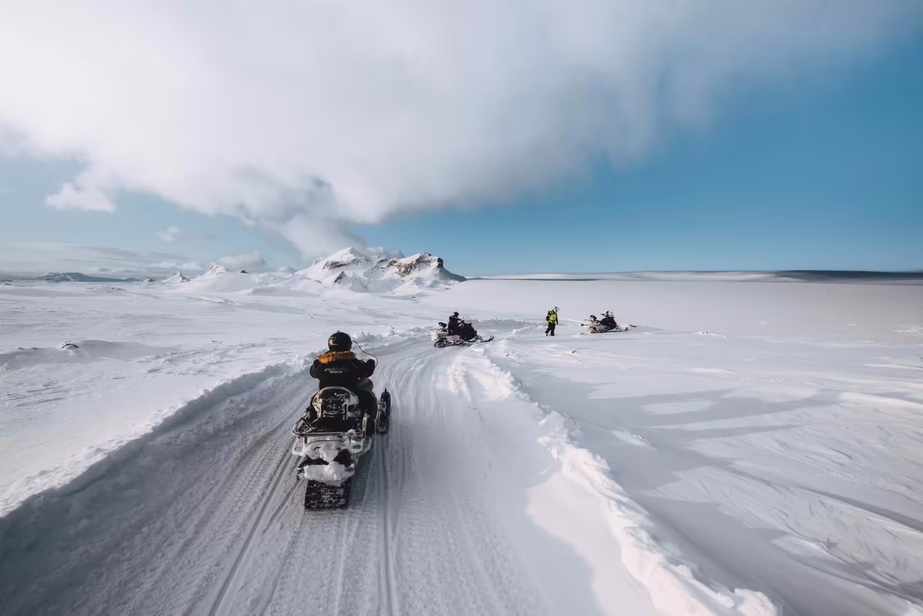 Guided snowmobilers on Langjökull glacier