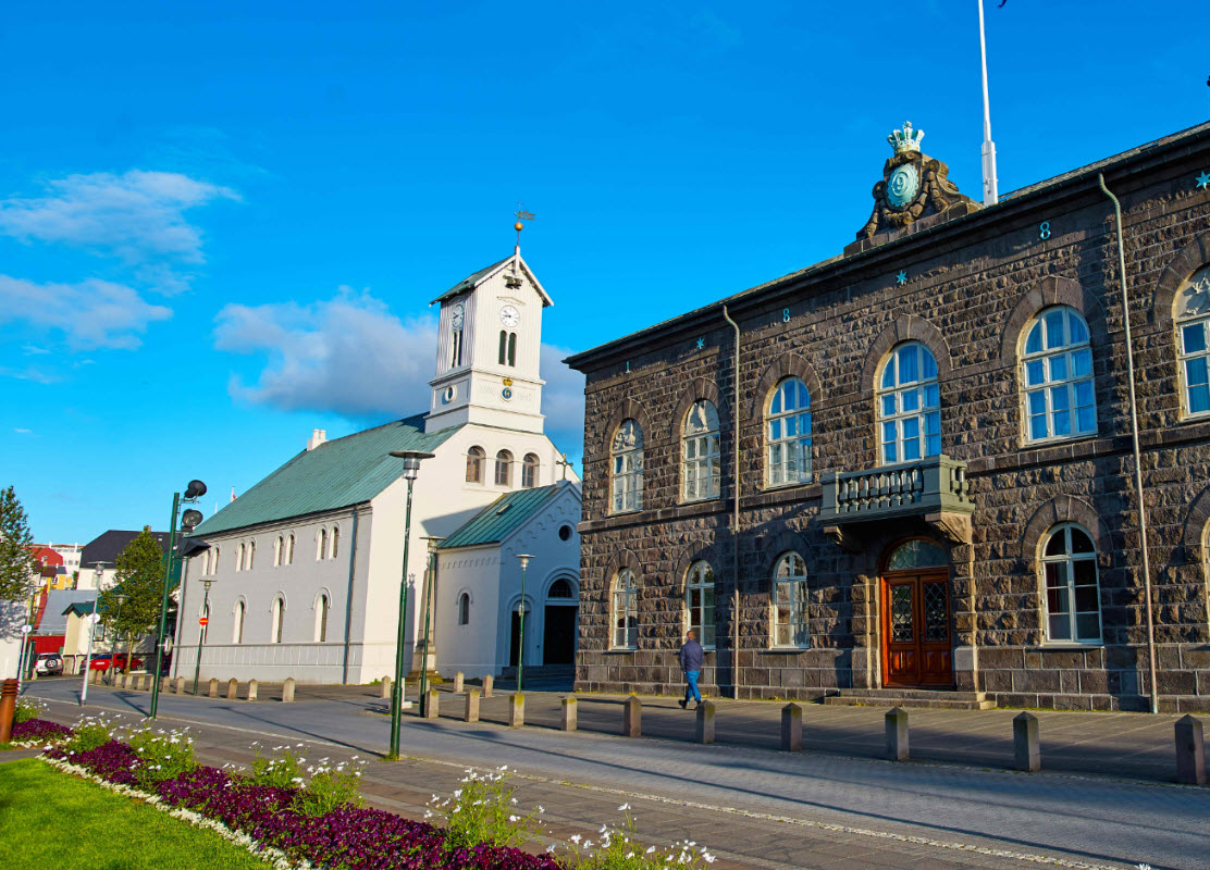 The Parliament House (Alþingishúsið) and The city's oldest church (Dómkirkjan) at Austurvöllur in Reykjavík