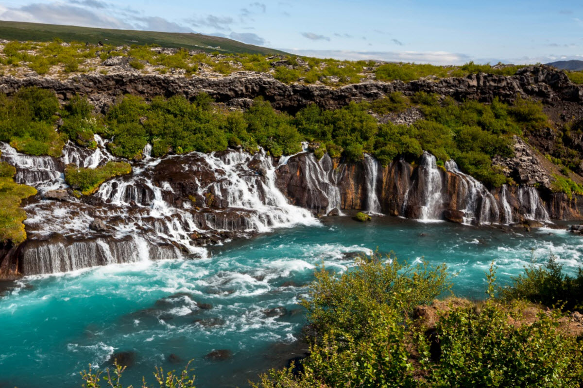 The beautiful waterfall Hraunfossar