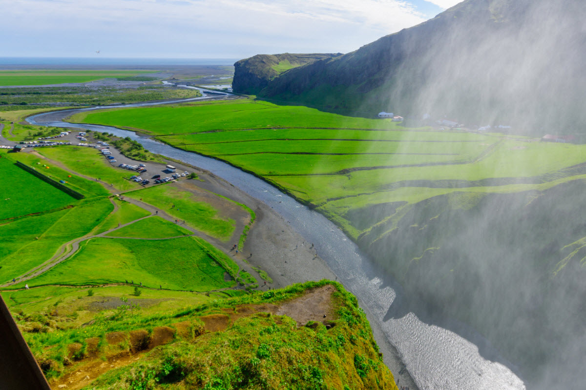 The view from the top of Skógarfoss waterfall and the beginning of the popular hike Fimmvörðuháls