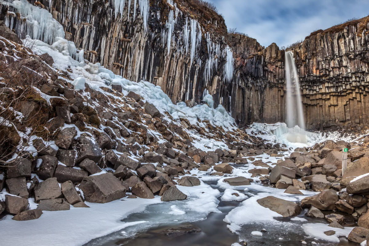 Svartifoss Waterfall during winter time in Iceland
