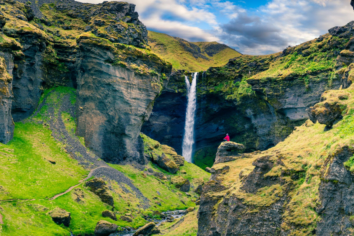 Kvernufoss waterfall is located in Kvernugil a gorge with picturesque hyaloclastite and basalt formations