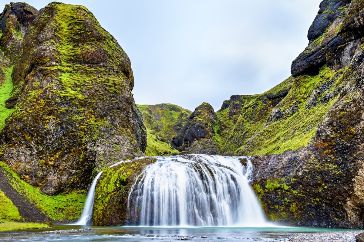 The view over Stjornarfoss waterfall in South Iceland during summer