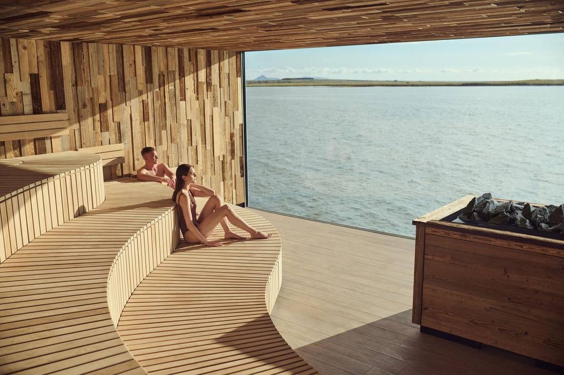 Ylur sauna at Sky Lagoon with wide ocean-facing windows