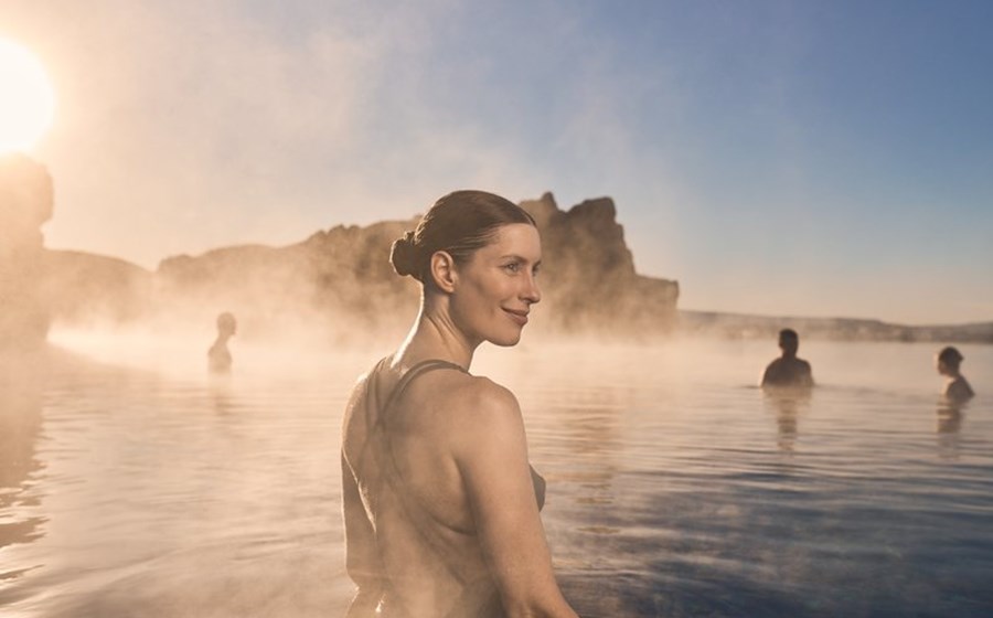 Guests relaxing in the warm lagoon during the first step of the Skjól ritual