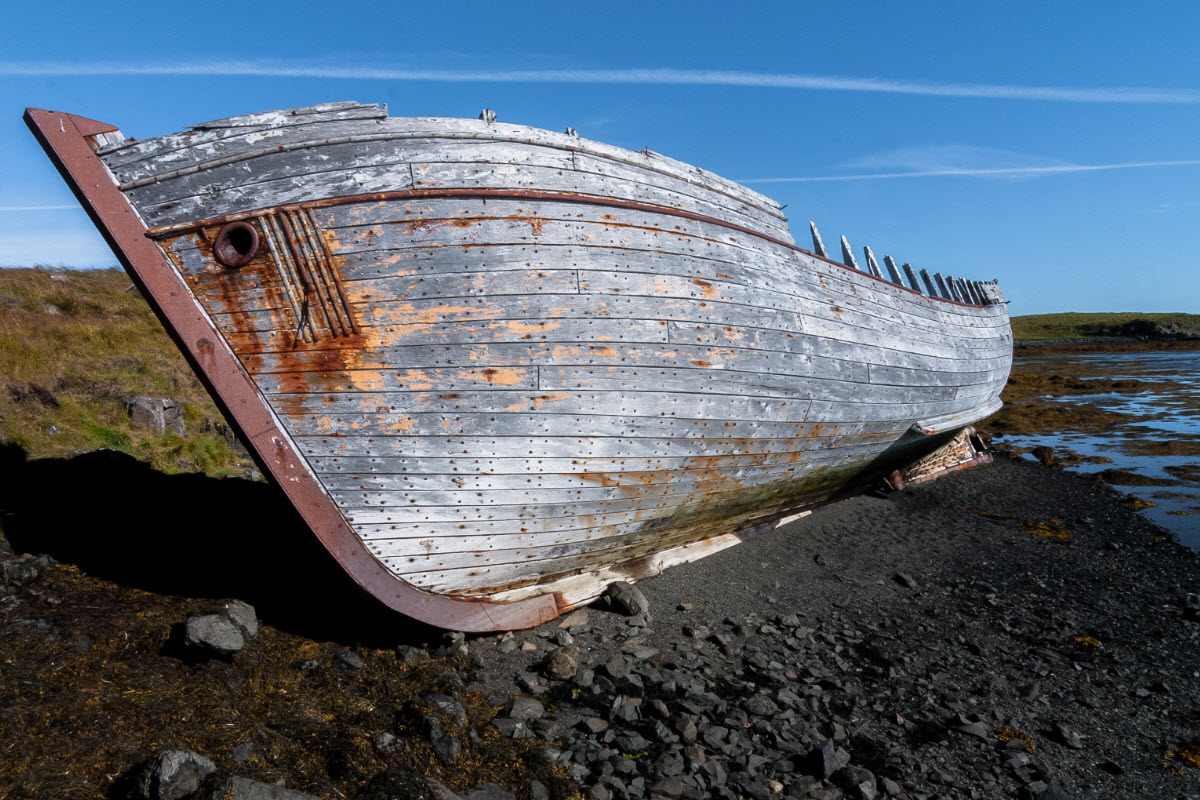 Wreck of fishing boat in Flatey island