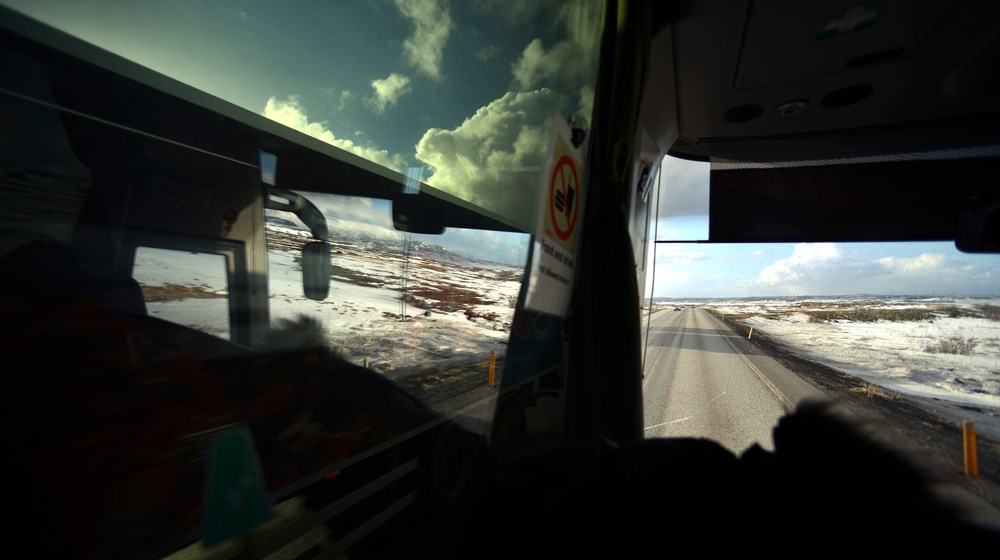View through a bus window during a winter journey in Iceland
