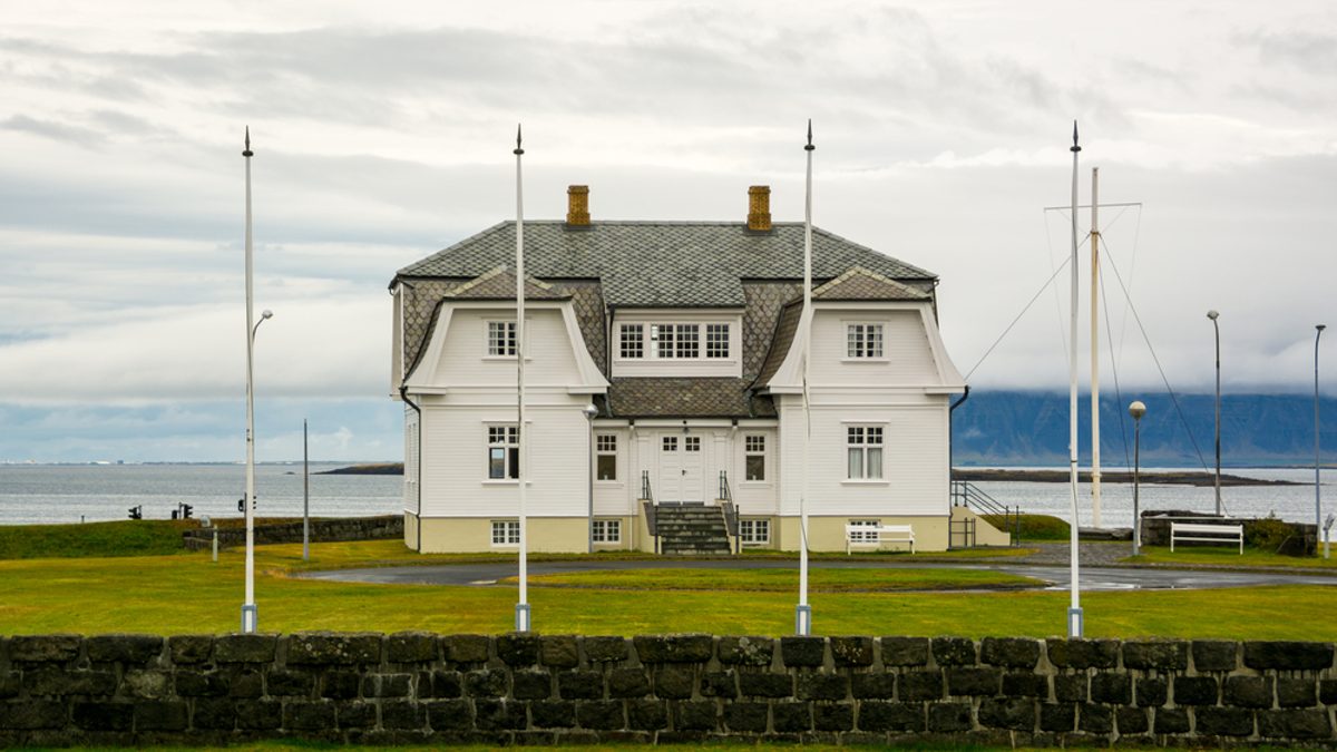 Höfði House, lawn and Reykjavík bay with Mount Esja beyond
