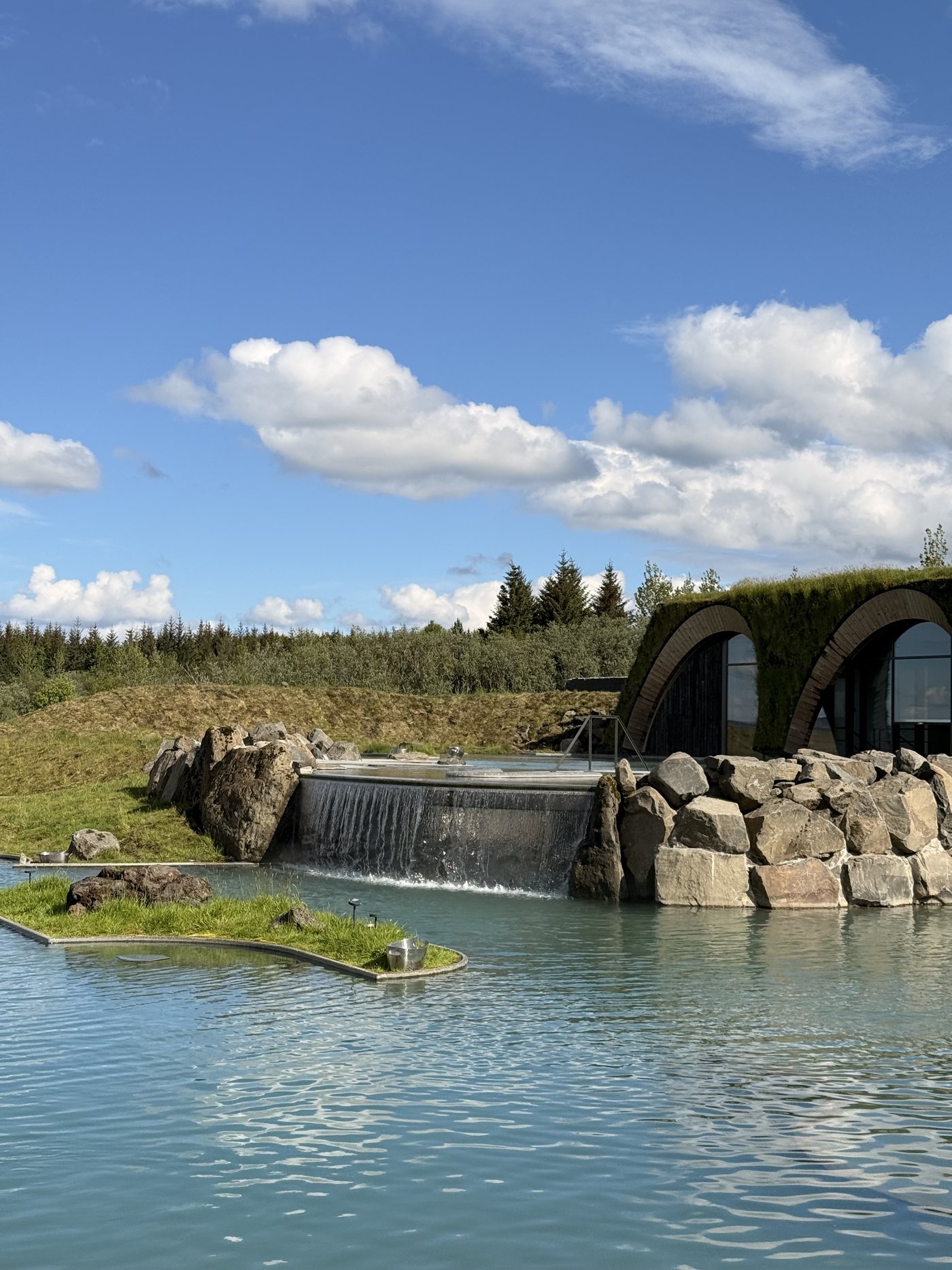 Warm geothermal water and waterfall pool at Laugaras Lagoon