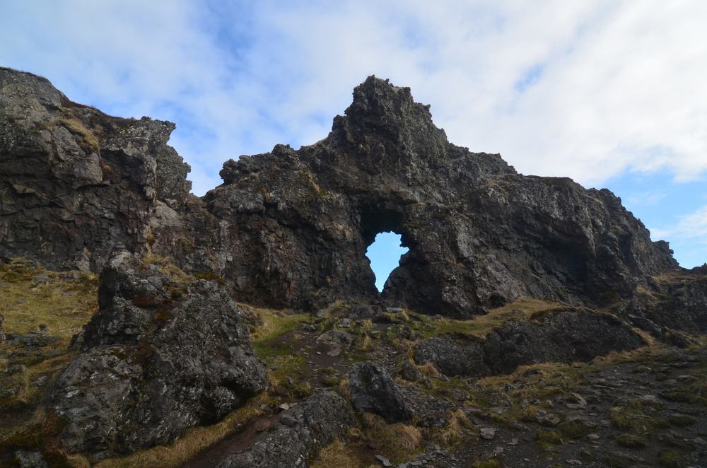 View through a lava formation near Dritvík Cove