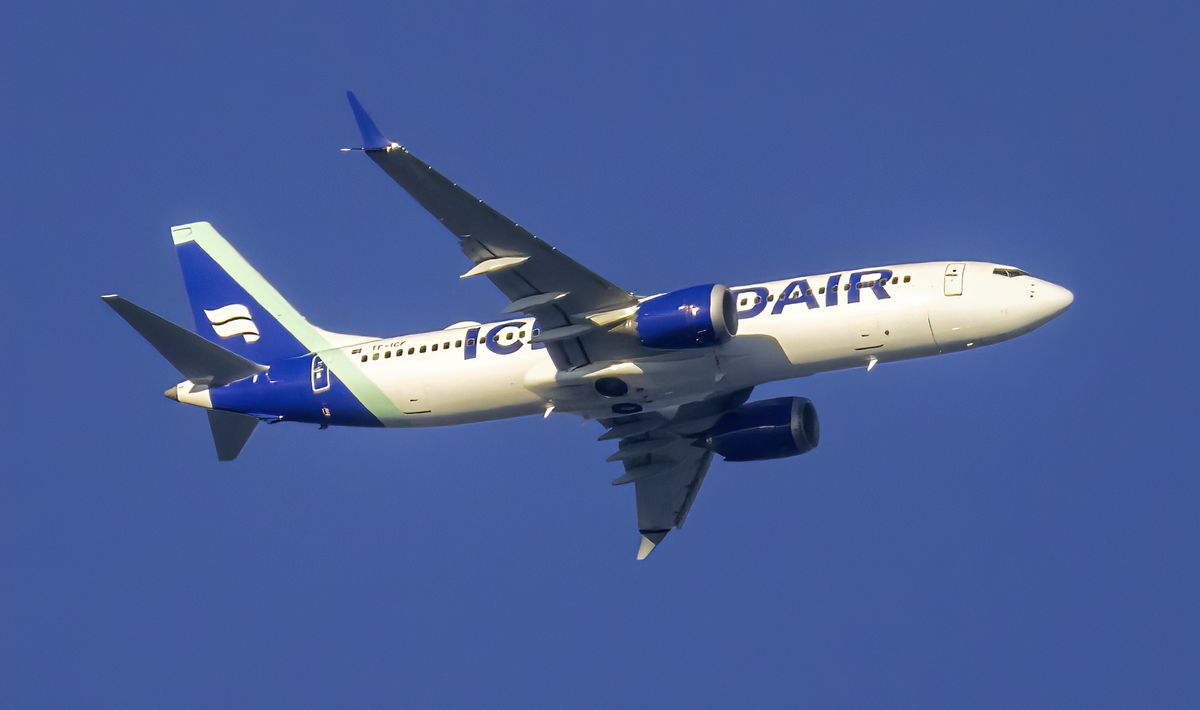 Icelandair Boeing 737 MAX 8 aircraft flying against a blue sky