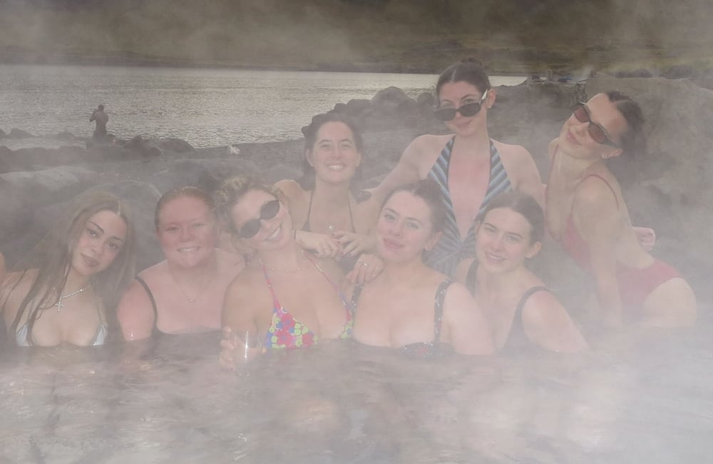 Ice Spice and Millie Bobby Brown with friends at Hvammsvík Hot Springs