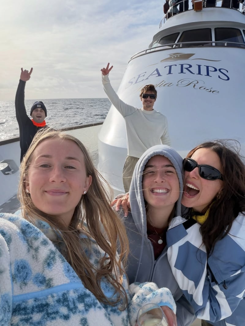 Millie Bobby Brown and friends aboard a whale-watching boat