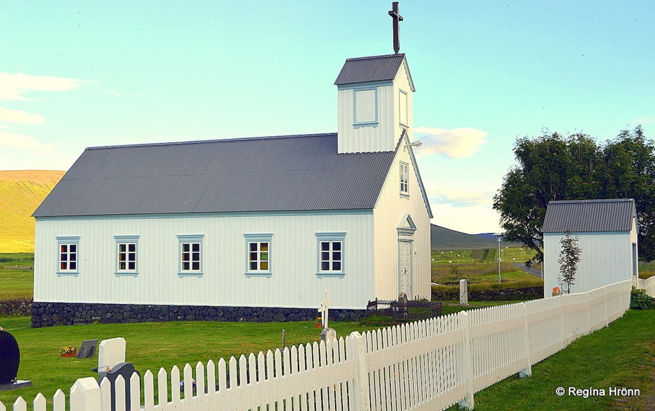 White church and green grass