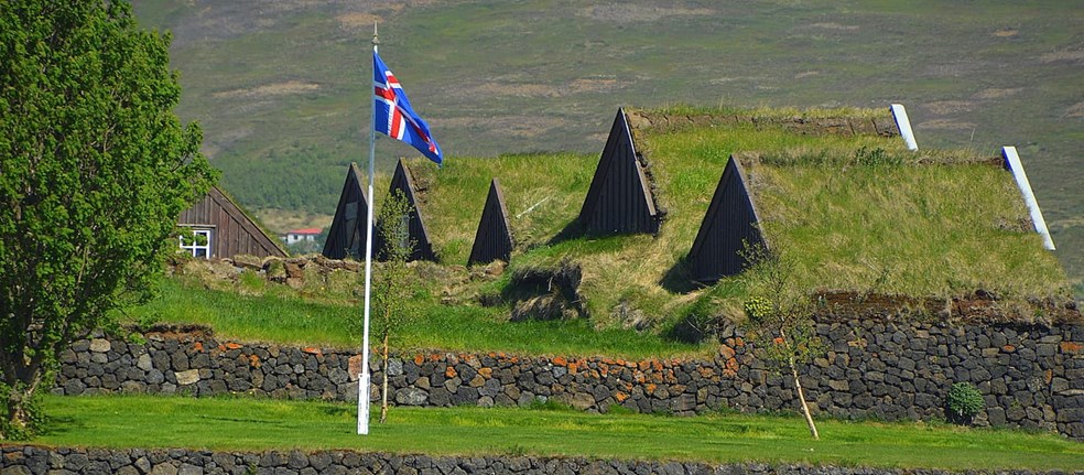 Icelandic flag and turf houses