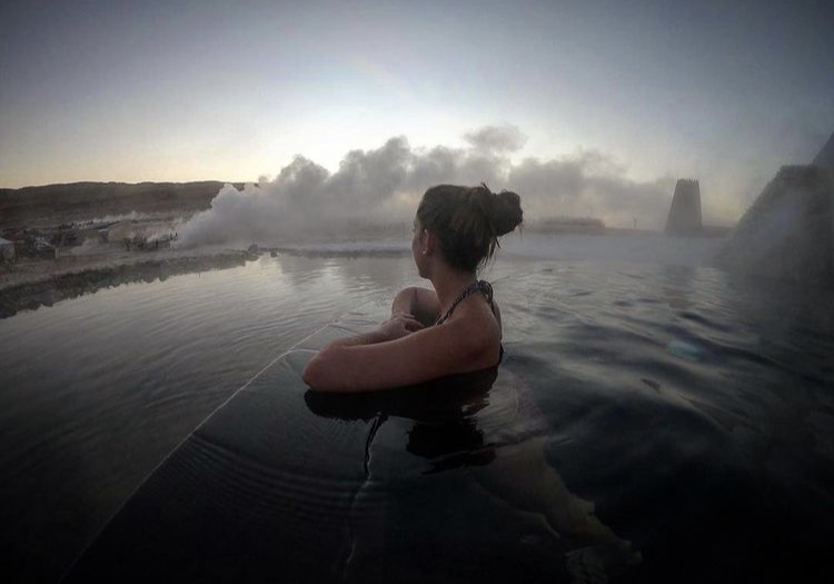 Woman inside a hot pool in a spa